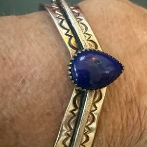 Artisan Silver Bracelet with Purple Gemstone